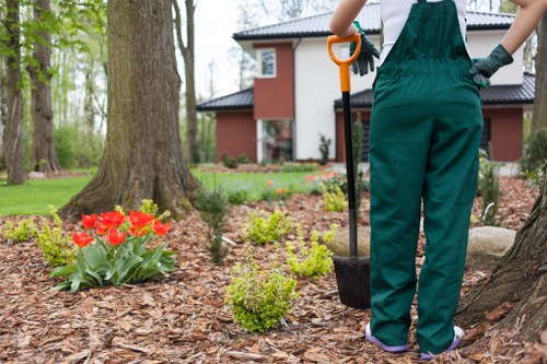 Garden clearance team removing mixed waste from an inner-city courtyard