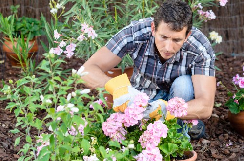 Supervisor documenting an incident report in a garden